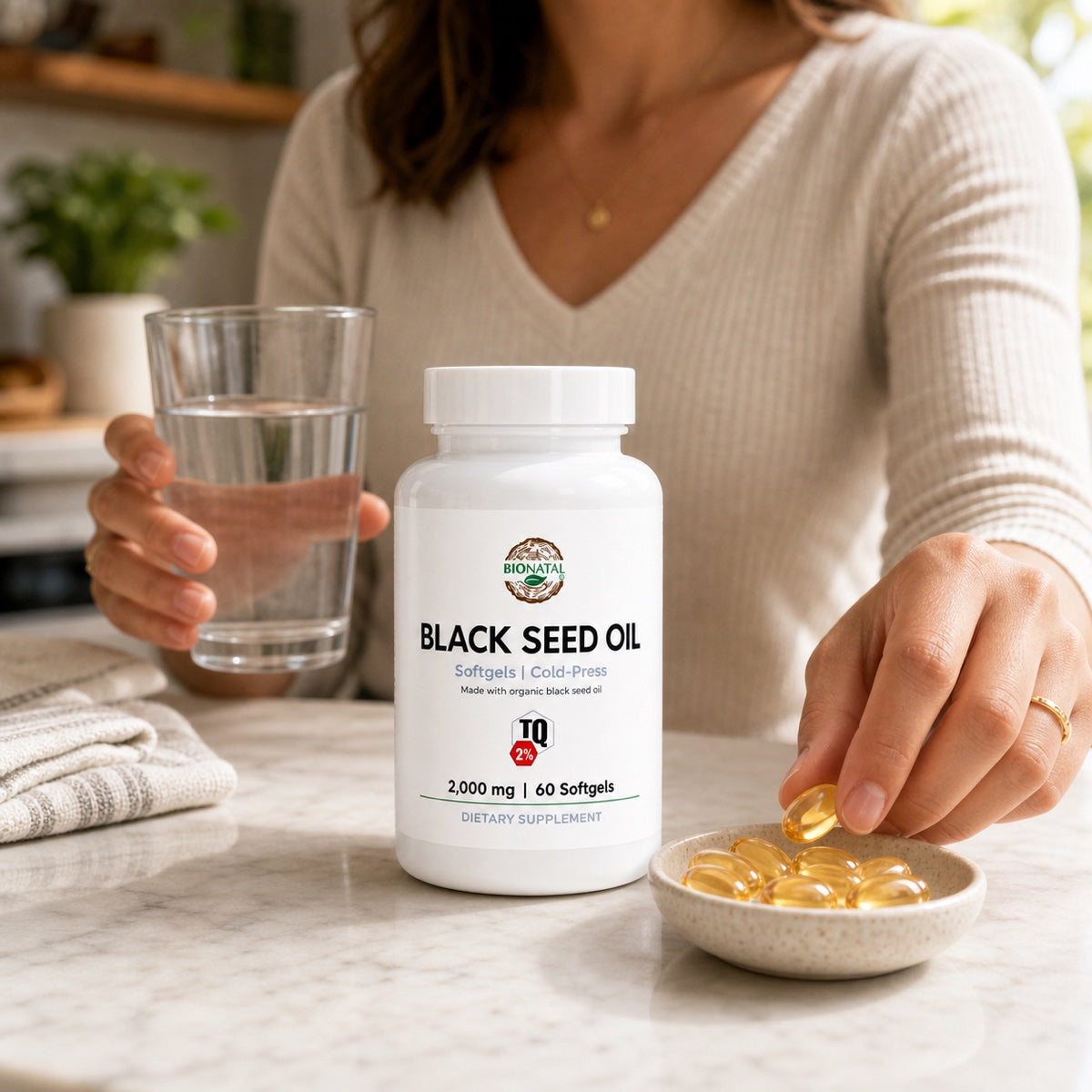 BioNatal black seed oil softgels in a morning routine setting